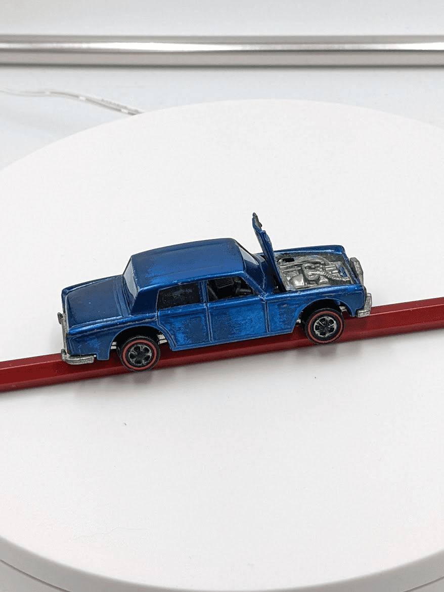 Vintage Hot Wheels Redline · Continental Sedan (Blue, door open)